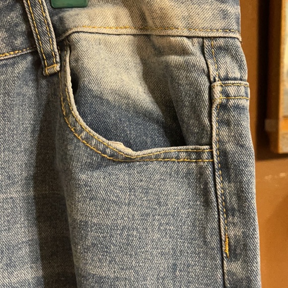 Ripped blue jeans - Picture 4 of 7